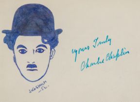 Charlie Chaplin (1889-1977). Autograph, signed in vibrant turquoise ink on vintage album page