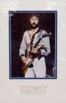 Eric Clapton Signed Display 12 x 18 inches Signed insert by Eric Clapton in Blue Biro.