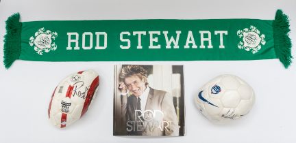Two signed Rod Stewart footballs with a green scarf and Tour programme. Signed on each ball (