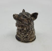 An early 20th century Russian silver stirrup cup, fashioned as a foxes head, impressed mark for 84