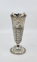 A silver spill vase, by Carrington & Co, London 1905, embossed, chased and engraved floral and
