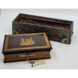 A Sorrento ware marquetry work jewellery box, the lid depicting dancing peasants, with two keys,