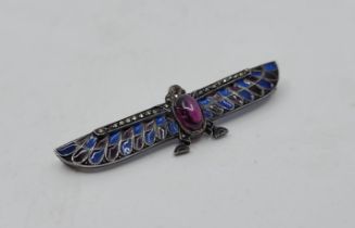 A continental Egyptian revival Argentium silver, marcasite and champleve enamel brooch, fashioned as