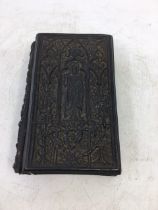 An 1856 bible (Carton Pierre binding)