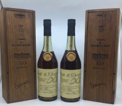 Cognac. 2 boxed bottles of Comte de Dampierre X.O. Chateaux de Plassac.  (2)