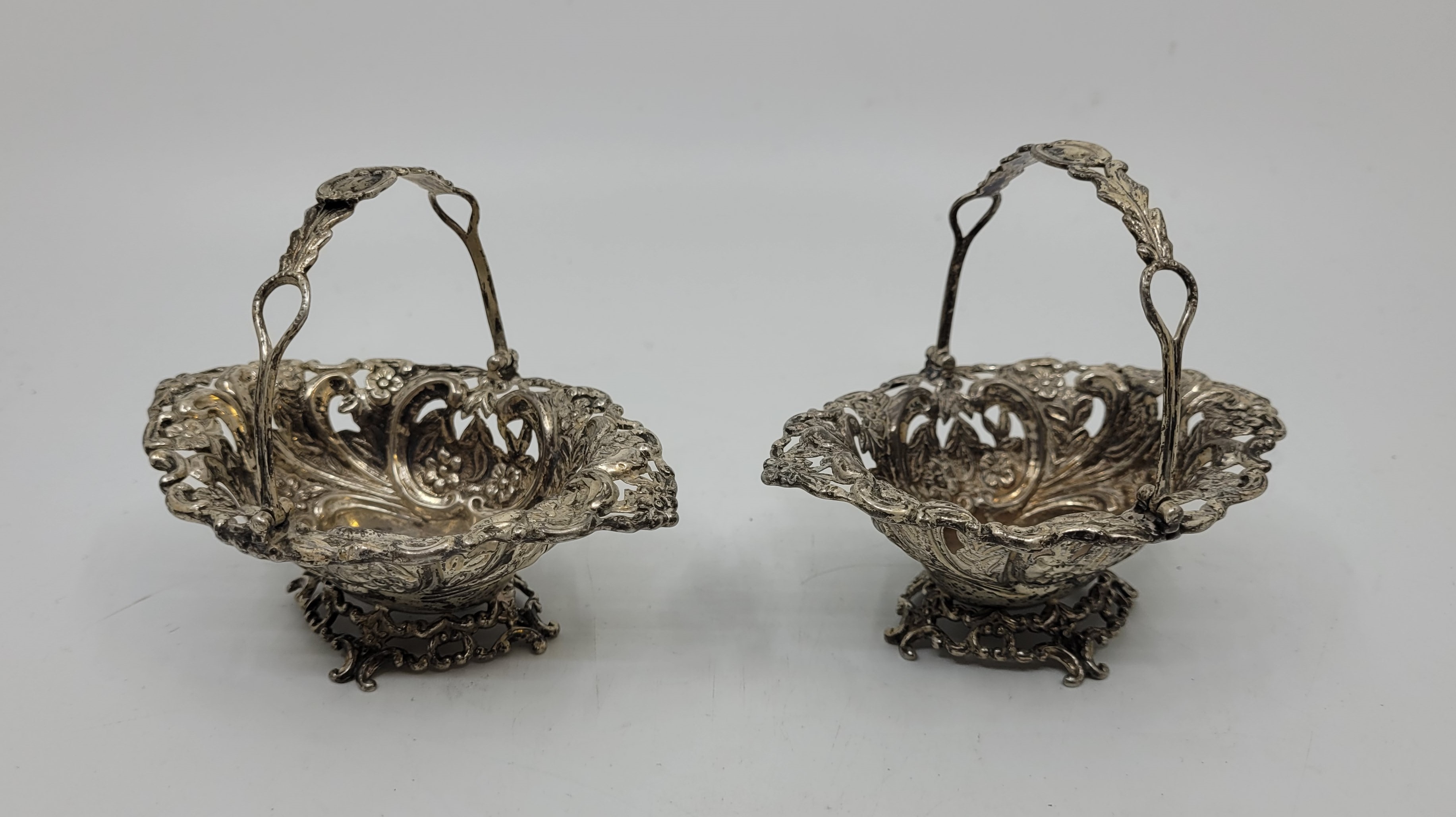 A pair of silver swing handled pierced bon bon baskets, by Joseph Hawkins (probably), Birmingham - Image 2 of 4