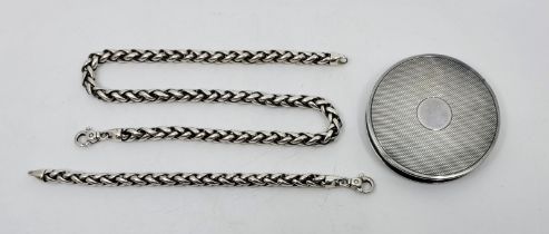 An Italian silver necklace and bracelet en suite, each 6mm wide chain formed from links interlocking