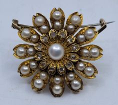 A Victorian yellow metal, pearl and rose-cut diamond set pendant/brooch, the circular mount