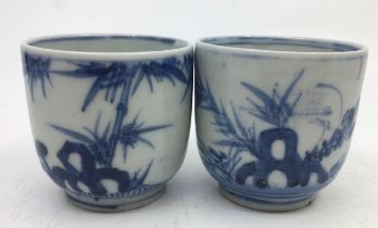A pair of Japanese Meiji period porcelain cups