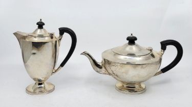 A silver teapot and jug, by Edward Barnard & Sons Ltd, London 1946, both with ebony loop handle