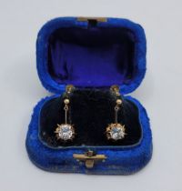 A pair of rolled gold drop earrings set cushion shape clear paste, drop 20mm, screw back fitting, in