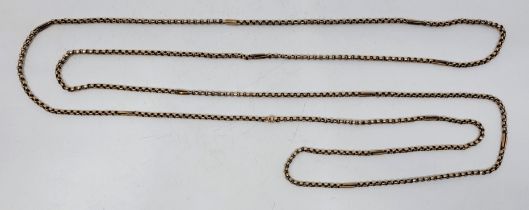 A 9ct. rose gold guard chain, fashioned from belcher and elongated links, length 151cm. (28.3g)