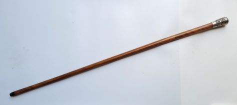 A Victorian silver mounted Malacca walking cane, the unmarked silver handle probably Chinese export,