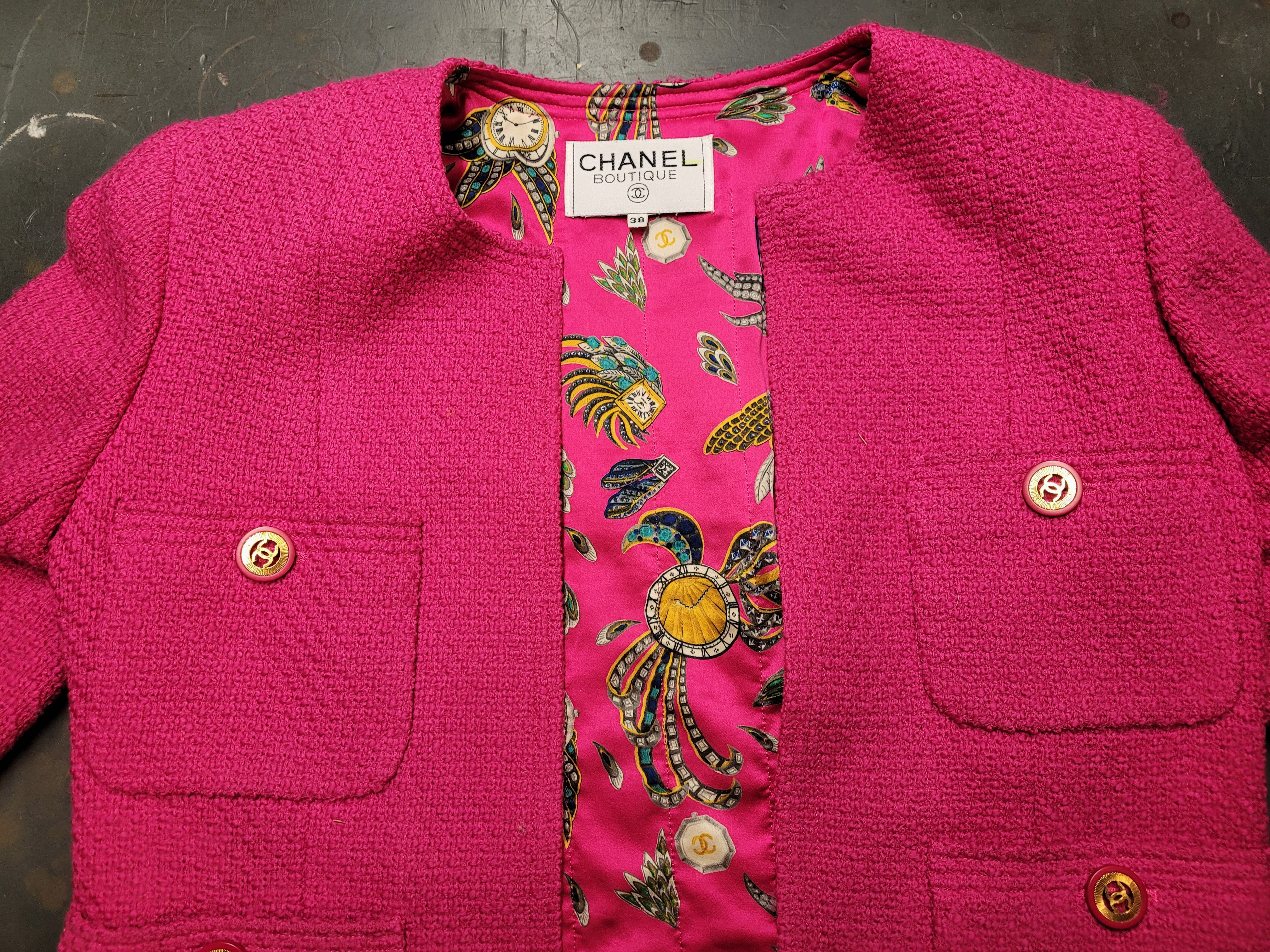 A Chanel Boutique "Hot Pink" two piece boucle suit, the jacket with printed silk lining four - Image 3 of 7