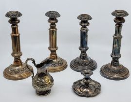 A set of four silver plated extending candlesticks, together with a large quantity of silver