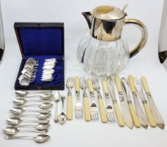 A set of twelve Dutch .33 silver coffee spoons, (144.1g), together with a continental silver