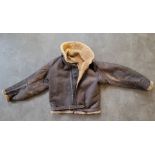 An RAF Irvin style leather and sheepskin lined flying jacket. Condition Note: some teeth to main zip