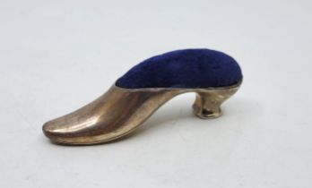 A novelty silver  "shoe" pin cushion, by S J Rose & Son, Birmingham 1966, length 11cm. (gross weight
