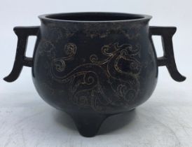 Chinese bronze censor with silver wire inlay of dragons. 3 3/4 x 6 3/4''