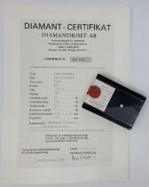 A round brilliant-cut diamond, in sealed perspex case with Swedish Diamanthuset AB certificate,