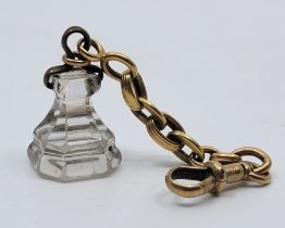 An octagonal form rock crystal fob seal, to precious yellow metal chain (yellow metal assessed as