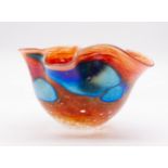 Siddy Langley handkerchief style iridescent vase blue panels on a red ground. Signed Siddy Langley