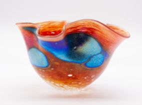 Siddy Langley handkerchief style iridescent vase blue panels on a red ground. Signed Siddy Langley