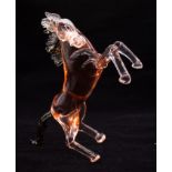 Pino Signoretto: A signed glass horse sculpture, with mottled brown tail and mane and a pink glass