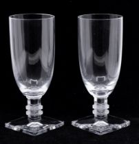 Lalique - A pair of modern glasses, having square footed bases and frosted areas with geometric
