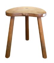 Workshop of Robert "Mouseman" Thompson - an oak three legged stool with kidney shaped top, and