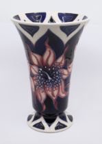 Moorcroft Pottery: a Moorcroft collectors club trumpet vase in 'Araura Pink Stargazer Lily' pattern.