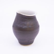 Dame Lucie Rie (1902-1995) Stoneware pouring vessel with manganese glaze to the body white glaze