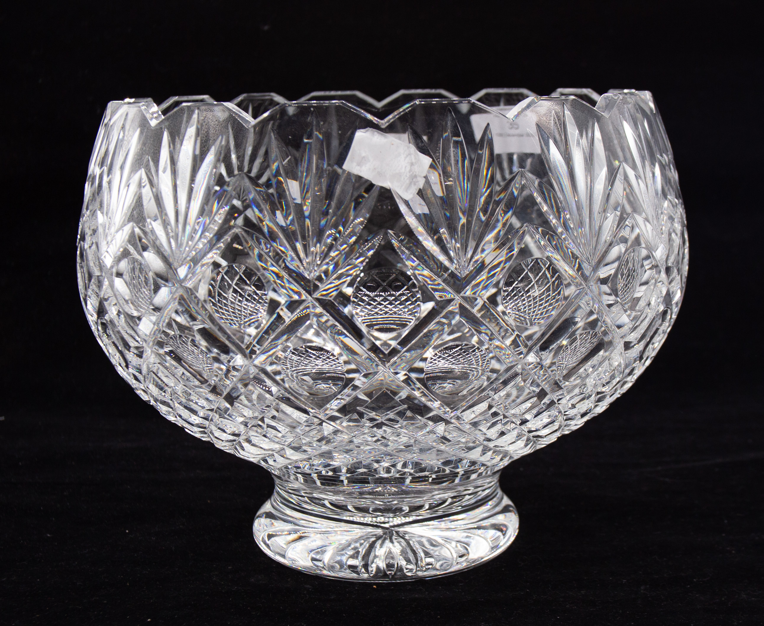 Waterford Crystal - A modern cut glass circular footed bowl, having geometric cut top rim, signed