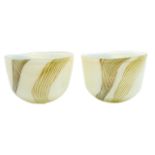 Svaja hand crafted art glass. A pair of matching bowls grey and brown swirls on a white ground.