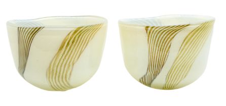 Svaja hand crafted art glass. A pair of matching bowls grey and brown swirls on a white ground.