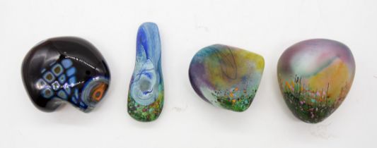 Studio glass paperweights 3 pebble paperweights in iridescent designs plus a dark blue paperweight