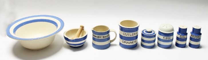 T G Green Cornish Ware. A small collection of items comprising cutlery drainer, Brandy Sauce jug,