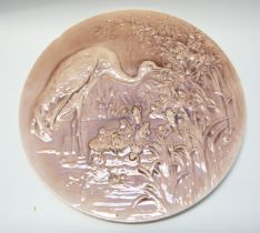 A late 19th Century large Burmantofts Faience charger, circa 1875, pink ground with raised moulded