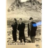 Simple Minds photograph by Guido Harari. 20X25 CM