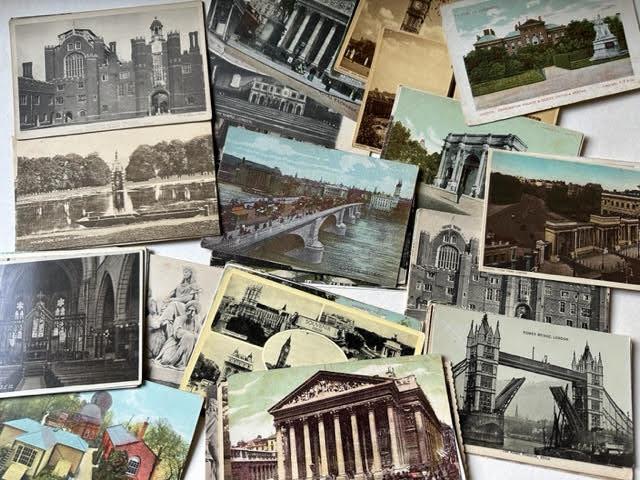 London postcards and an album of London photographs. Mid 20thC. Approx 60