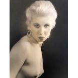 Vintage glamour photographs, including a print and single photograph in two calendars.