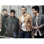 Group of photographs some signed by celebrities including Stereophonics, Lemmy, New Seekers.