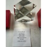 Embossed Glass Paperweight in Cartier red box. With printed card saying that it celebrates 10