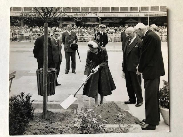 Queen Elizabeth vintage press photograph. Planting a tree at a public engagement. Press stamp on rev - Image 2 of 5
