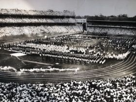 Press Photograph from Melbourne Olympics. Ron Clarke carrying the Olympic torch in 1956 Approx 17x23