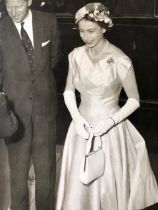 Queen Elizabeth and Prince Phillip vintage press photograph, glamorous formal dress. (S22)