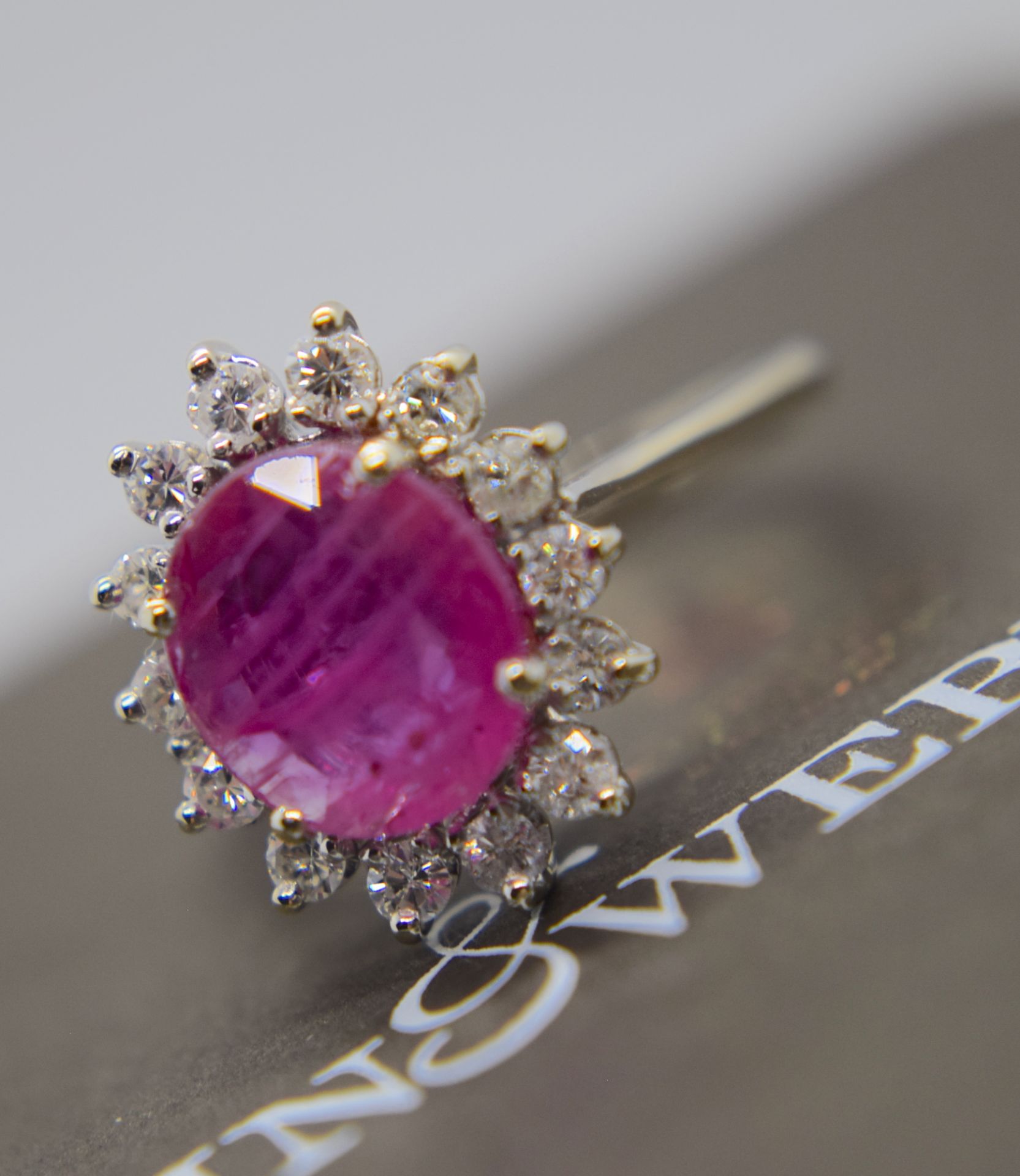 2.50CT RUBY & DIAMOND HALO RING IN 18K WHITE GOLD (SIZE N)