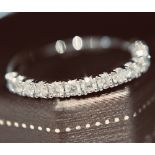PLATINUM DIAMOND ETERNITY RING FROM BROWNS JEWELLERS (0.66CT VS2 - G QUALITY)