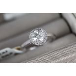 0.90CT PLATINUM ROUND BRILLIANT CUT HALO DIAMOND RING - IGI CERTIFIED