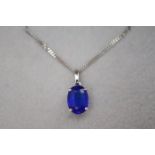 1.00CT SAPPHIRE - OVAL CUT SOLITAIRE PENDANT in 9K WHITE GOLD WITH CHAIN